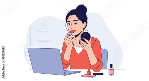 Young woman looking at her reflection in a small mirror while applying red lipstick at a desk with a laptop and makeup.