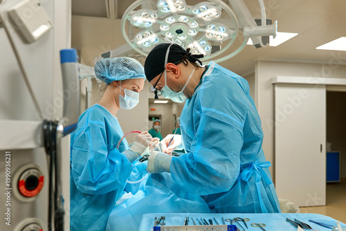 plastic surgeon performs surgery in the operating room