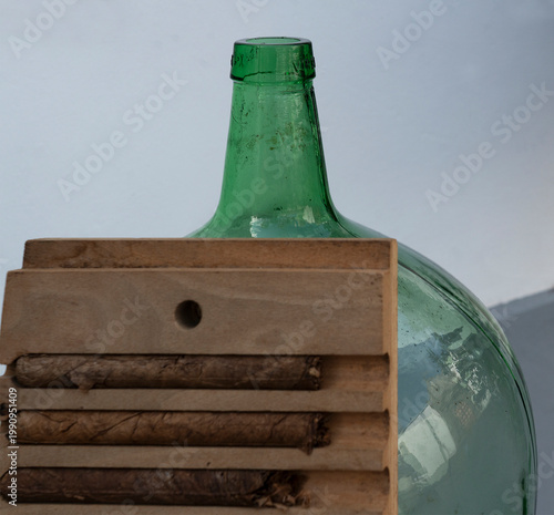 green glass bottle and cigars in the box, Canary islands