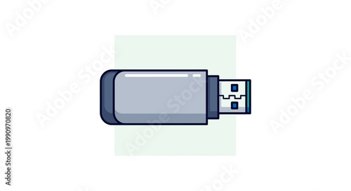 a gray usb flash drive on a green background.