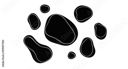 Black oil droplets float on water surface in close-up view