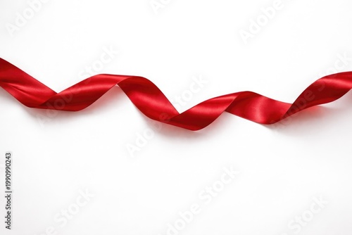 Horizontal flowing red ribbon on white backdrop offering spacious text copy space