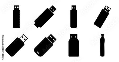 Various Silhouettes of USB Flash Drives Arranged on a White Background