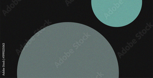 Photos Two colored circles on a black background with gray and blue hues