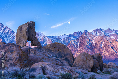 Bild auf Leinwand Boot Arch at sunrise with moon and Sierra Nevada mountains, Alabama Hills Califo