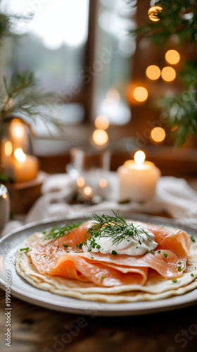 Gourmet pancakes with smoked salmon and chives on wooden table  