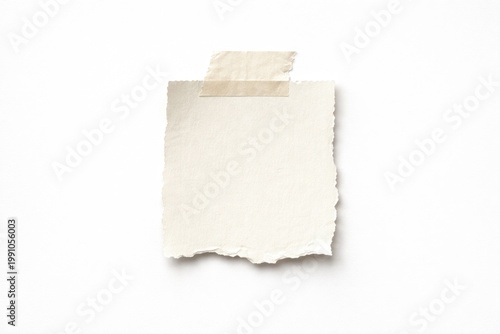 Flat lay of blank torn paper tag secured with adhesive tape showing copy space