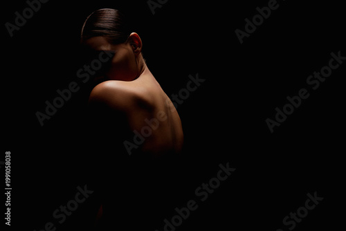 Nude Woman silhouette. Back of Beautiful Naked Body Girl