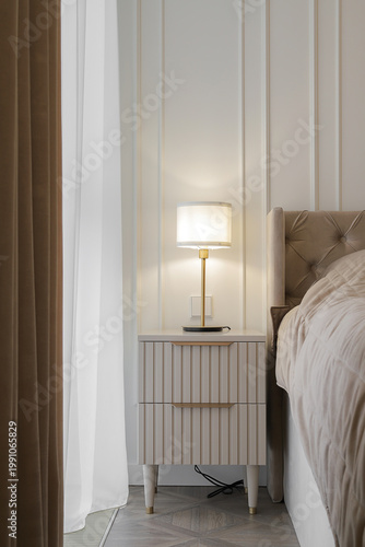 Bedside table with table lamp
