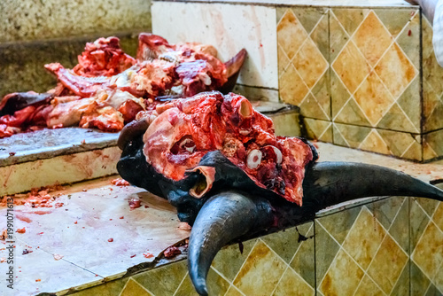 Pieces of fresh raw meat at the food market at Zanzibar