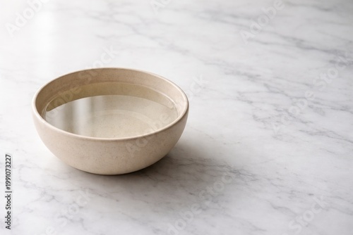 Water filled beige bowl res...
