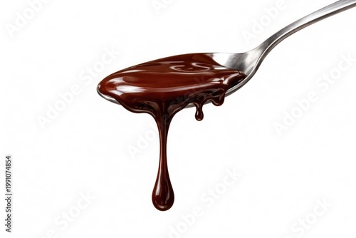 Spoon covered in chocolate ...