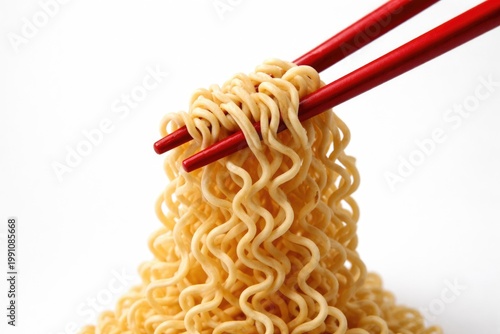 Closeup of red chopsticks g...