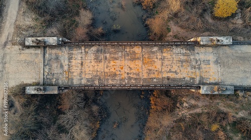 Historic American bridge concrete textures aerial view weathered infrastructure spanning natural waterway revealing aged construction patterns