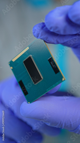 Картината върху платно Scientists and engineer shows CPU Central Processing Unit in the hand