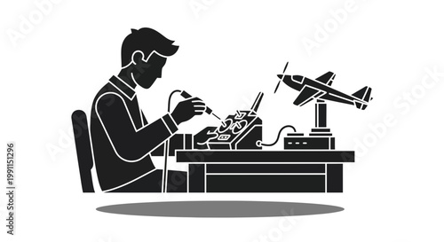 Man repairing RC transmitter with soldering iron and model airplane