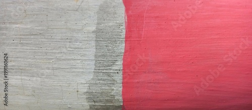 Red and white painted concrete wall texture