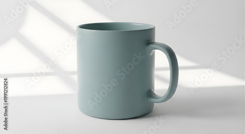 Isolated sage green ceramic mug with clean matte finish, soft window sunlight casting aesthetic shadows, tea or coffee drinkware