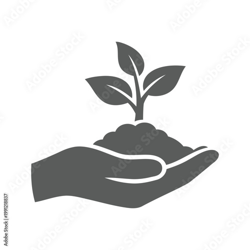 Hand Holding Soil with Growing Plant
