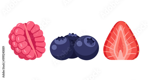 Set of fresh delicious summer berries including raspberry blueberry and sliced strawberry.