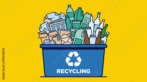 Recycling bin with various recyclables.