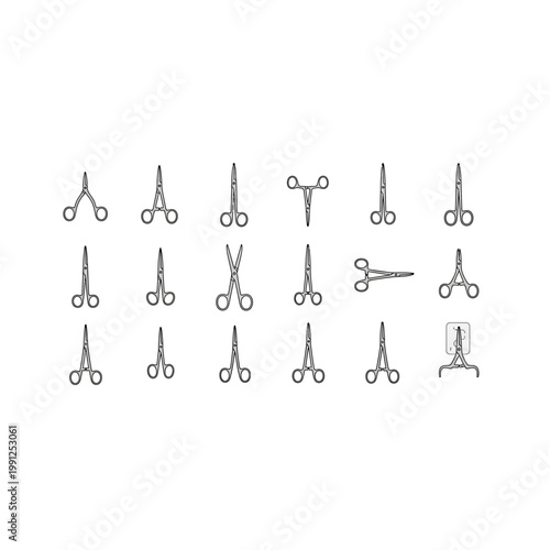 Collection of surgical forceps and scissors on white background with surgical