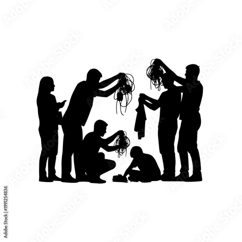 Silhouette of a Technical Crew Working with Tangled Cables and Wires