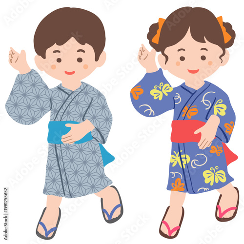 浴衣を着て踊る子供たち