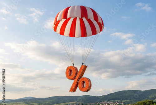 A vibrant red parachute on a blue sky with fluffy clouds captures the fun of summer air flight over the ocean