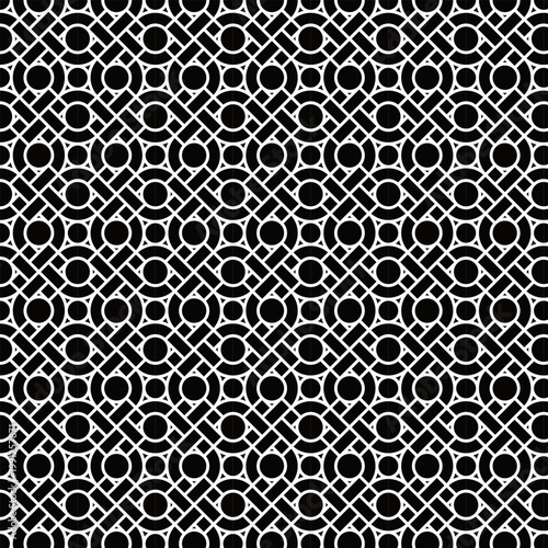 The background features tiles arranged in an eye-like pattern, composed of circles and squares with black lines around them.