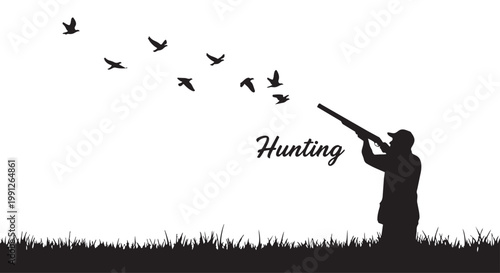 Silhouette of a man hunting birds with a shotgun in a field