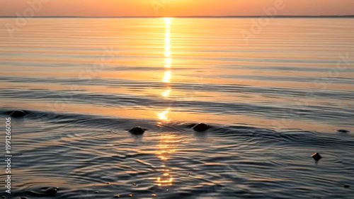 Serene Sunset over Calm Ocean Waters.