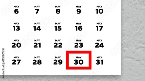 The date May 30th marked with a red cursor on the wall calendar 2026