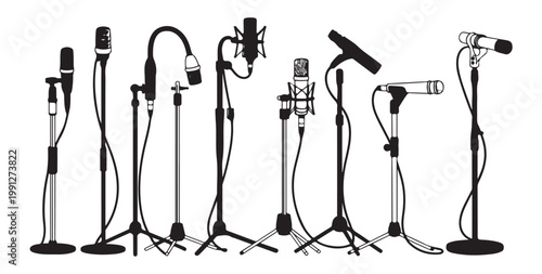 Professional studio microphone collection on various stands for music production and podcast.