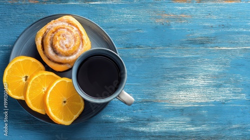 Coffee and Pastry with Orange Slices on Wooden Table.