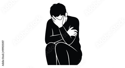 A silhouette of a person sitting with their head in their hands expressing sadness or despair on a white background