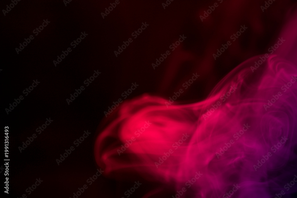 Obraz premium Colorful Smoke Swirls in Artistic Background of Red and Purple Hues