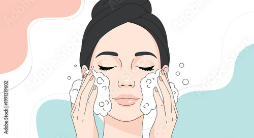 Beautiful woman gently washing her face with cleansing foam to maintain clear and healthy skin as part of her daily beauty routine.
