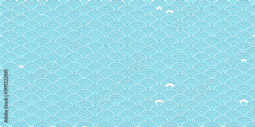 A seamless pattern of overlapping turquoise scales resembling ocean waves