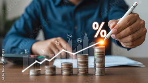 Hand shows financial growth with rising coin stacks and a large percentage symbol indicating increased interest
