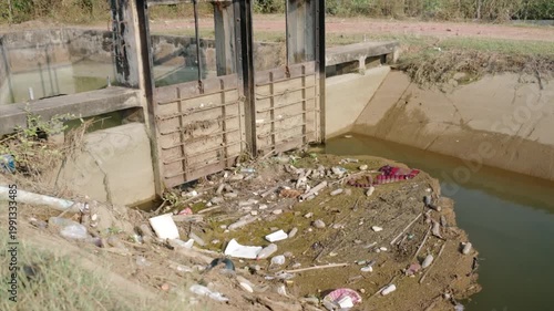 Agricultural Water Sluice Gate Control System in a Rural Irrigation Canal with Metal Mechanisms and Concrete Structure