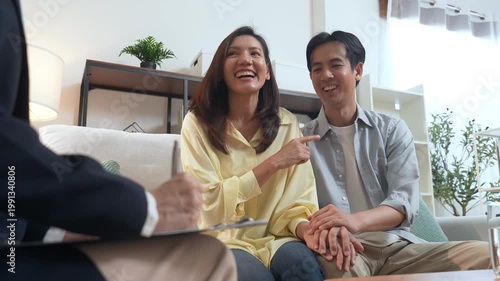 Couples therapy counselor psychotherapist for family and couple relationship communication support guidance, counseling session strengthens relationship while partners hold hands in calm home setting