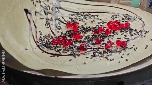 Thai style crepe on hot pan.