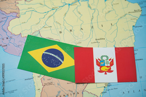 Konstfotografi Close up of Brazil and Peru flags on map of South America.