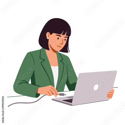 Woman working on laptop at desk with papers and smiling
