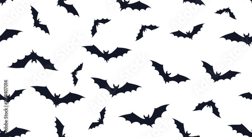 Seamless background pattern features black silhouettes of bats flying in various directions over a clean white background.