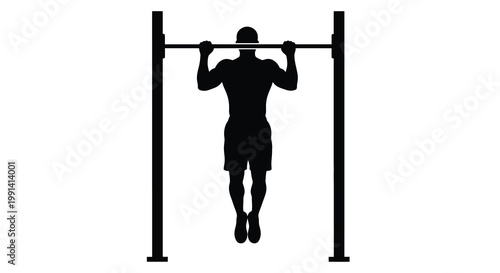 Silhouette of a man performing a pull up on a black metal bar