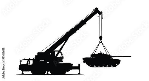 A black silhouette of a mobile crane lifting a main battle tank