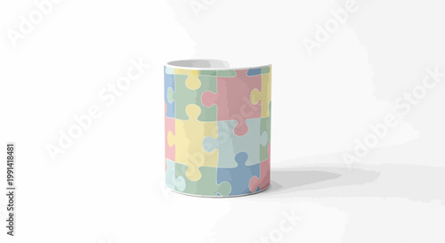 A colorful puzzle piece mug sits on a white surface indoors.