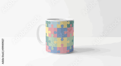 A colorful puzzle piece design on a mug sits on a white table indoors.